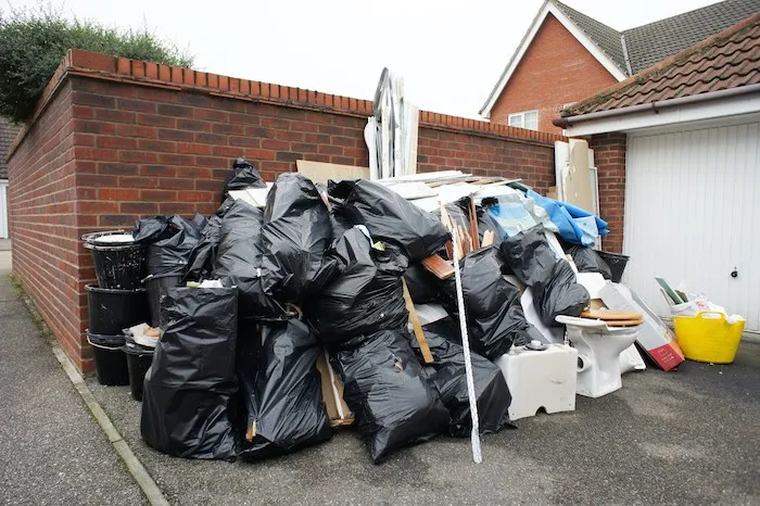 Full property trash-out in progress